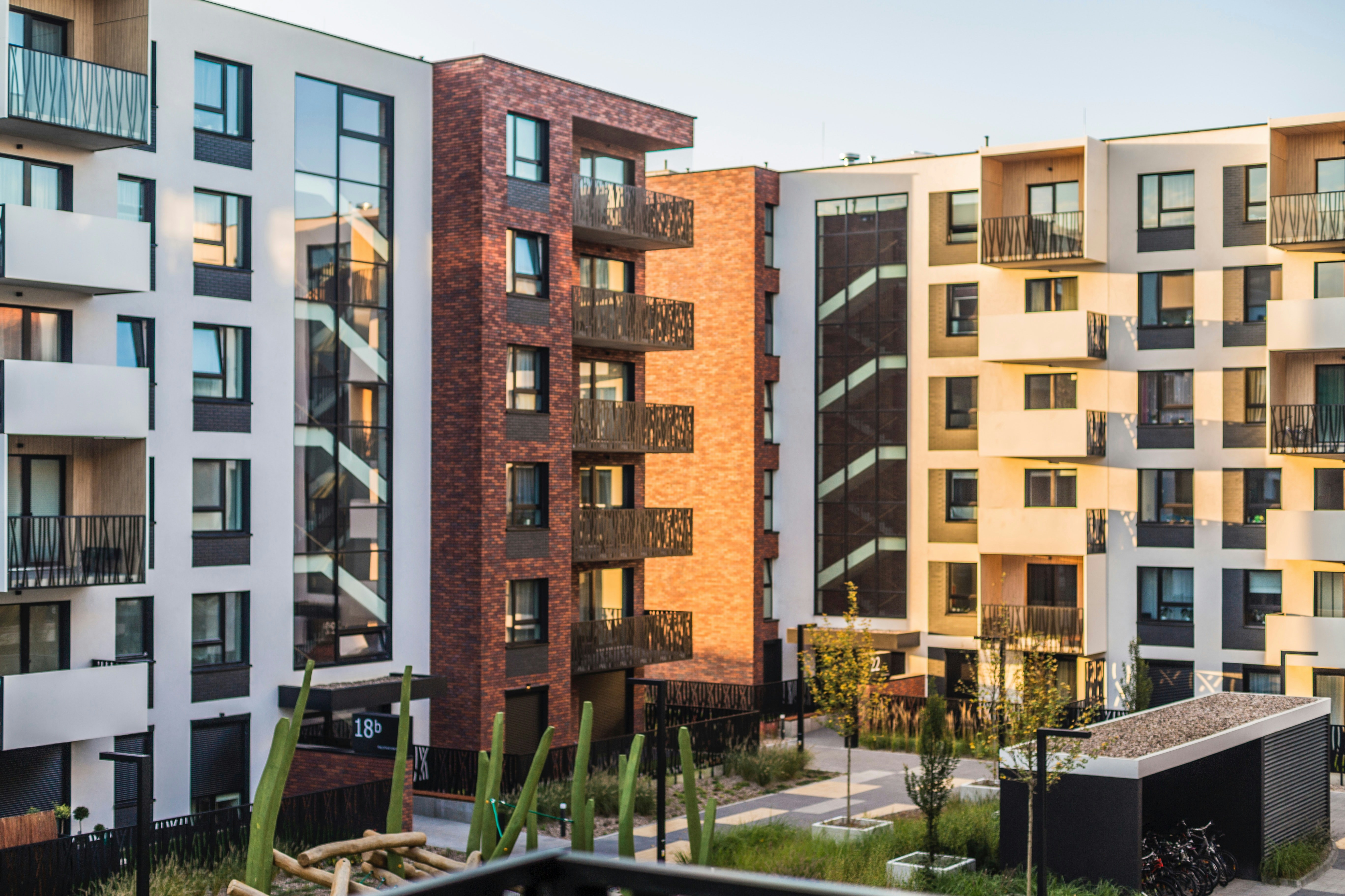 Multi-unit apartment building exterior — the type of property Spore Shield tests for landlords and property managers across Metro Detroit.